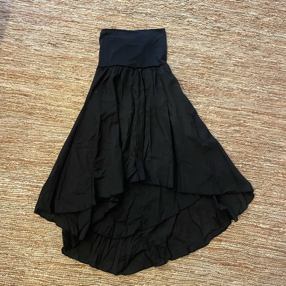 Black asymmetrical skirt.